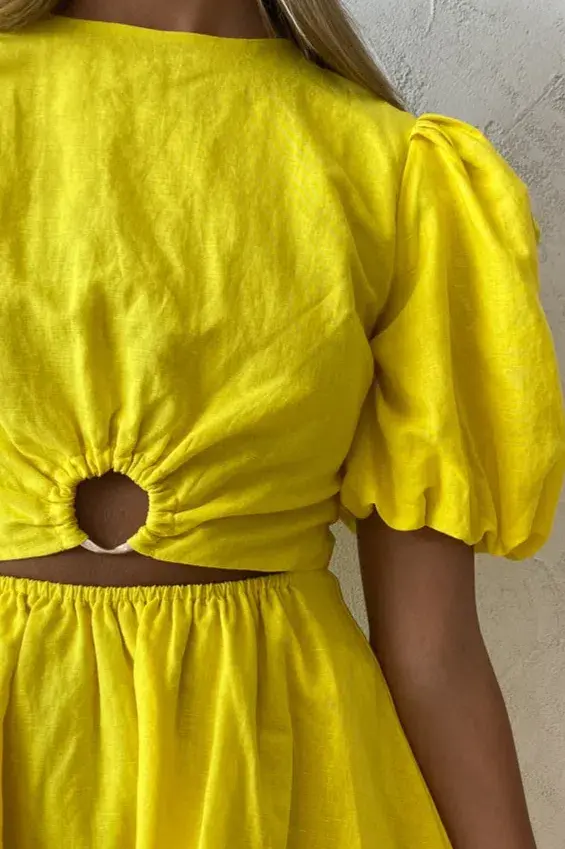 By Nicola Dahlia Ring Detail Mini Dress Yellow Size 10 for rent on The Volte - main image