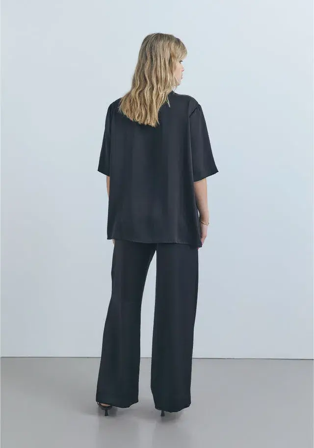Viktoria and Woods Chorus Top and Pilot Pant Set Black for rent on The Volte - main image