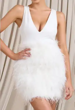 Club L London Flirt Plunge Front Mini Dress with Feather Skirt White Size 4 for rent on The Volte - image 3