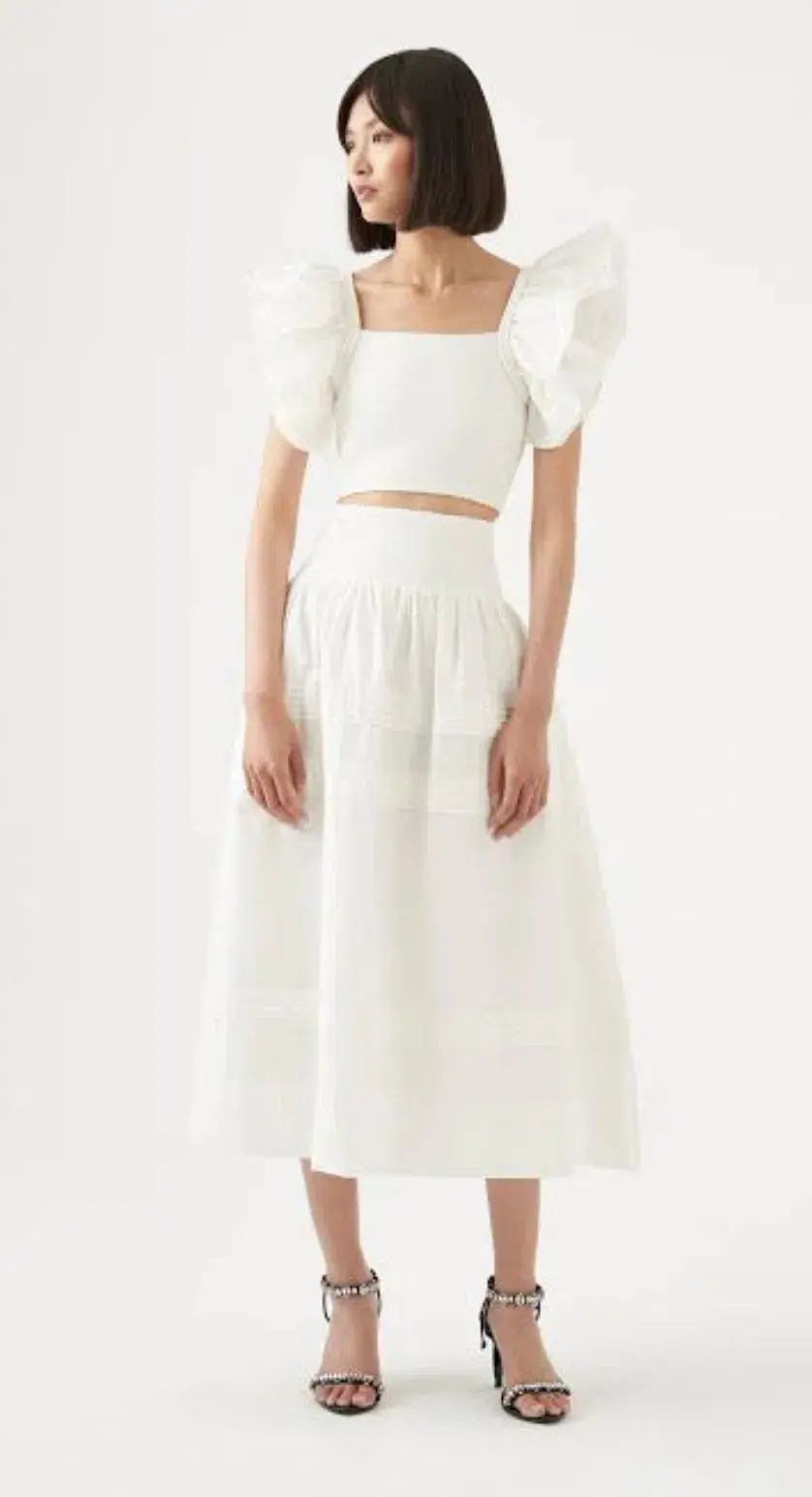 Aje Corinne Knit Bodice Crop Top and Rosalie Knit Waist Midi Skirt Set in Ivory Size XL / AU 16 for rent on The Volte - main image