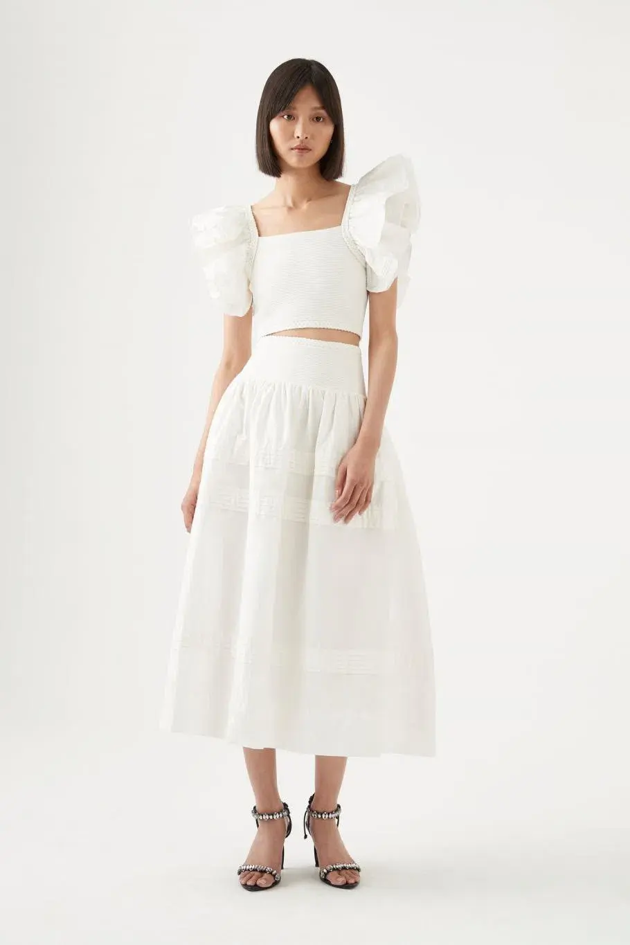 Aje Corinne Knit Bodice Crop Top and Rosalie Knit Waist Midi Skirt Set in Ivory Size XL / AU 16 for rent on The Volte - main image